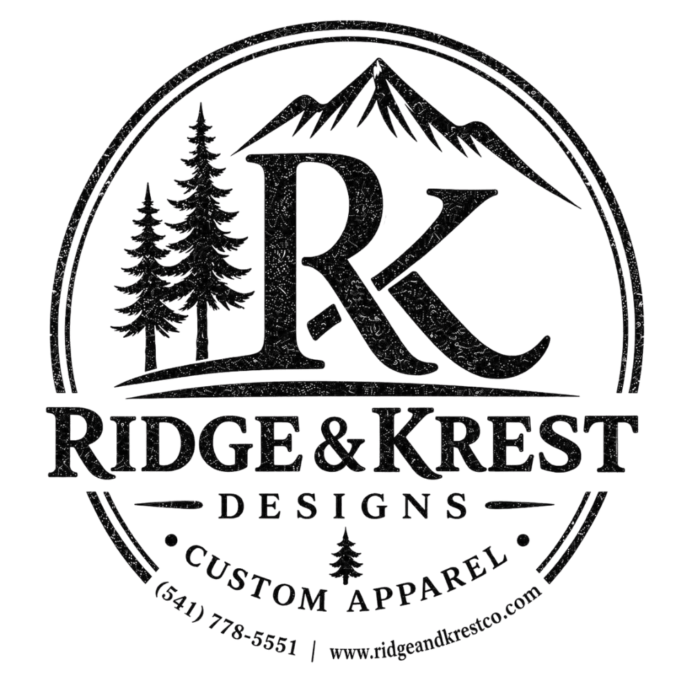 Ridge & Krest Designs circular black-and-white logo featuring mountain peaks, evergreen trees, and intertwined R and K initials